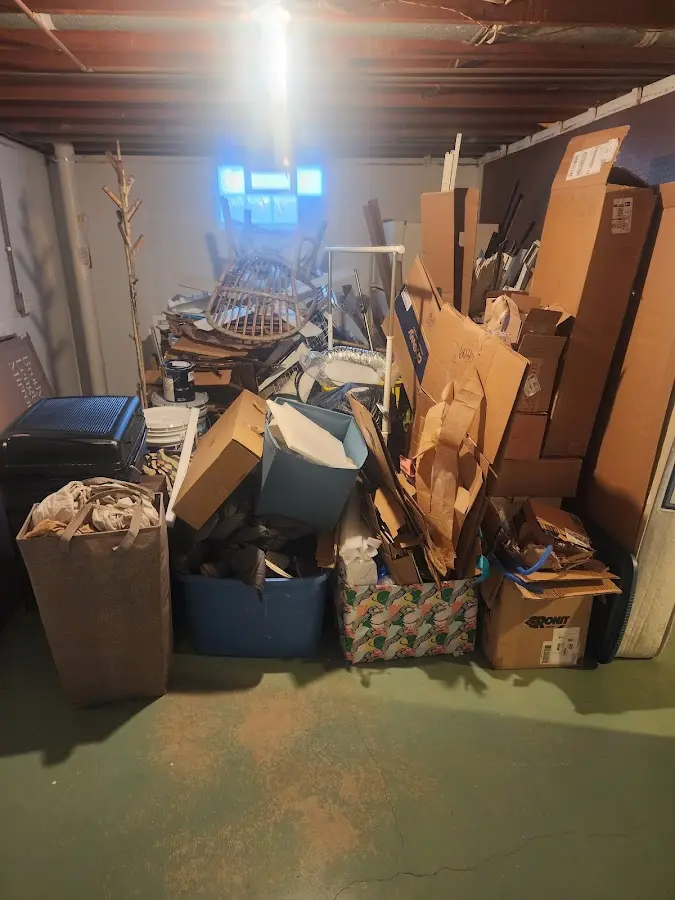 Roll-off dumpster container at job site for 6 Yard Dumpster Rental in Orchard Mesa